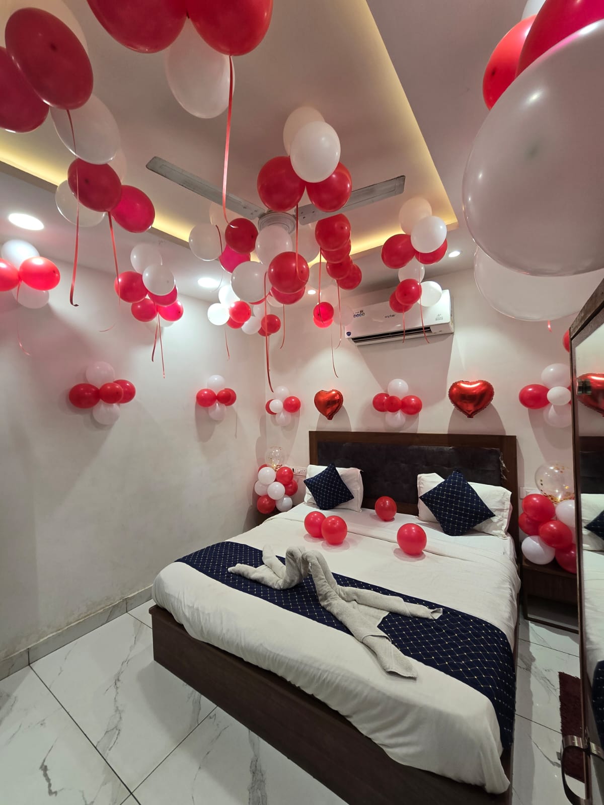 Romantic decorated room with heart balloons
